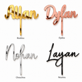 Toppers prénom : Allan en Boubou or miroir, Dylan en Dydou rose miroir, Nohan en Chouchou argent miroir et Layan en Nounou noir miroir